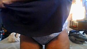 Granny slips into tight dress teasing her fat ebony pussy and big natural tits with dirty talk before getting fucked homemade!