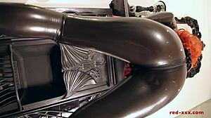 hey redhead lubes latex catsuit fingers juicy wet pussy in wet delights