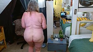 Granny Dawnskye parades curves and fuzzy pussy in panties!