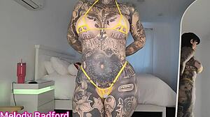 micro bikini haul shows off huge fake tits big asses tattoos