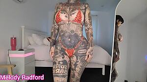 micro bikini haul shows off huge fake tits big asses tattoos