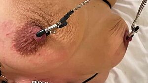 he plays so hard with my dark puffy nipples squeezin stretchin me in bondage ugh