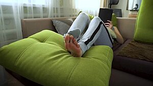 Amateur girl slowly teases her wrinkled socks and bare feet up close