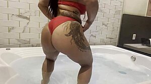 She sensually teases her curves soaking wet in the steamy bathtub play