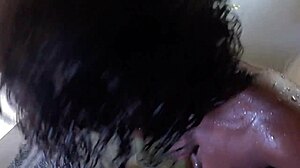 ebony milf slips into shower with new toy and someone peeks in curiously