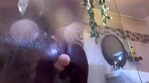 ebony milf slips into shower with new toy and someone peeks in curiously
