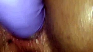 Teen ebony stretches her ass wide with huge black anal dildo close up