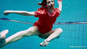 sexy tight-pussy teen avenna dives naked into the pool showing off her shaved nude twat underwater