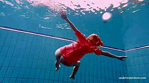 sexy tight-pussy teen avenna dives naked into the pool showing off her shaved nude twat underwater