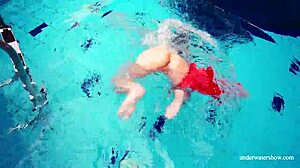 sexy tight-pussy teen avenna dives naked into the pool showing off her shaved nude twat underwater