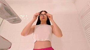 Beautiful college coed slips on tiny miniskirt flashing white panties for night out