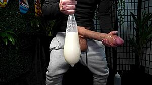 Huge cock explodes condom cum then drinks piss vs monster