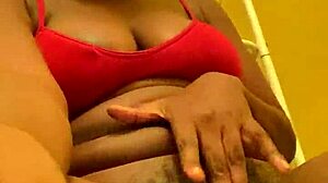 Sexy Ebony Brunette with Bangs Spreads Legs Close-Up Pissing Stream from Shaved Pussy