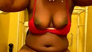 Sexy Ebony Brunette with Bangs Spreads Legs Close-Up Pissing Stream from Shaved Pussy