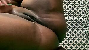teasing her tight spot with something huge and wild