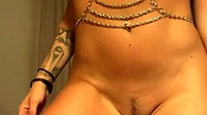 very hot tattooed brunette squirts hard with dildo and satisfyer vibrator play!