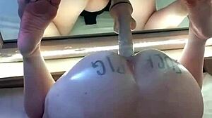 AMATEUR FUCKPIG BUCKS WILD AGAINST DILDO ON MIRROR FOR CASH CUM ORGASM