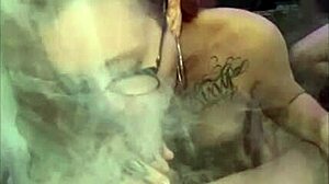 smoking fetish babe teases huge tattooed cock