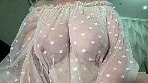 A plump milf shows off her gorgeous saggy big natural tits up close.