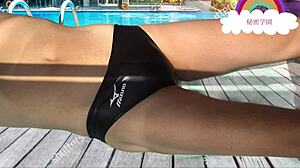 Schoolgirl slips into latex swimsuit for secret pool handjob fetish outdoors