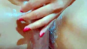 pink-shaved college brunette babe rubs wet asian pussy to orgasm