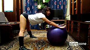 damn naked amateur brunette hottie bounces tits groping pussy on workout exercise ball