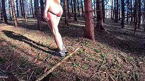 forest path tease in sexy harness reveals juicy cameltoe for watchers