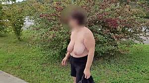MILF flashes her huge saggy natural tits boldly in crowded public spots