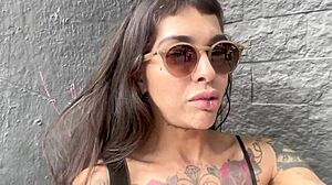 nasty lesbian sluts finger and lick at crowded carnival while crowds stare