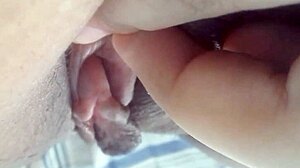 amateur teases her huge throbbing clit up close homemade