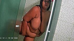 Hidden camera catches busty bbw neighbor shaving her big ass and natural tits