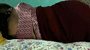 Mysterious Sanjana Aunty Teases Ass in Tight Maroon Saree