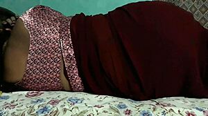 Mysterious Sanjana Aunty Teases Ass in Tight Maroon Saree