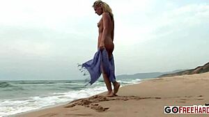 zuzana z teases nipples while masturbating solo on chilly beach
