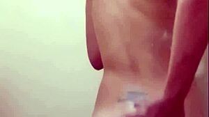 I'm taking a refreshing shower in this steamy video