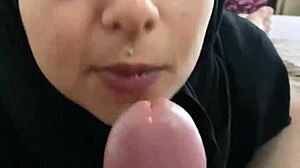 she's this arab housewife mia niqab who casually drops to her knees in the kitchen, licks his balls slow then gulps down every drop of his hot cum while her husband films the whole homemade mess