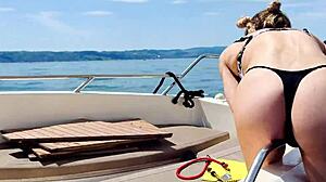 omg summer heat got me washing this boat in my sexy thong bikini feeling so hot...
