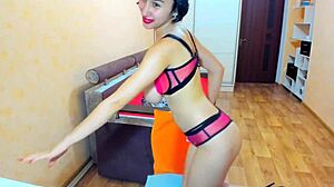 brunette bombshell in pink bra heels spreads shaved pussy lips for dildo fun