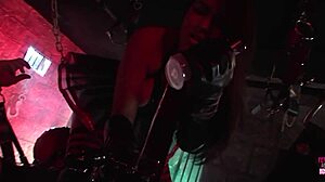 a brunette in latex bondage ties guy and rides his strapon cock!!