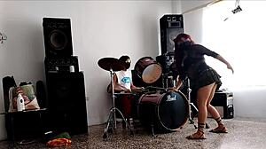 She drums wildly then strips teasing her huge curvy ass for neighbors