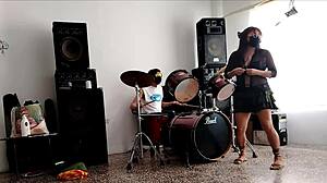 She drums wildly then strips teasing her huge curvy ass for neighbors