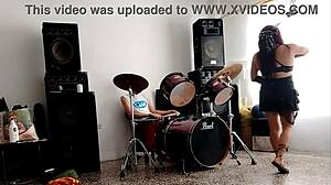 She drums wildly then strips teasing her huge curvy ass for neighbors