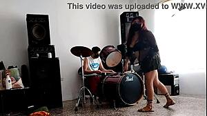 She drums wildly then strips teasing her huge curvy ass for neighbors
