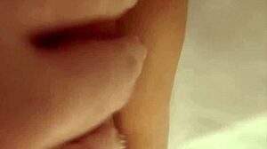 Abigail steps into the shower, lathers up, and carefully shaves her smooth pussy clean