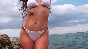 bikini babe on beach feelin so sexy n petite outdoors public tease uh...