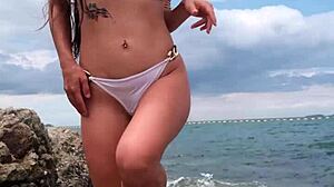 bikini babe on beach feelin so sexy n petite outdoors public tease uh...