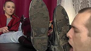 What secrets hide in that extreme muddy boot lick under her commanding gaze?