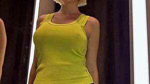 spy cam catches curvy big tits blonde trying wet see-through skirt outfit in public changing room upskirt