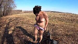 check out this big ass housewife flashing her thong over pantyhose outdoors