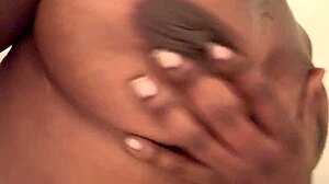 she steps under the warm shower water soaking her skin completely
